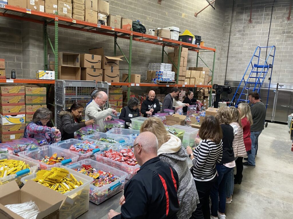 Eastern Savings Bank Volunteers prepare kits at Baltimore Hunger Project February 2023